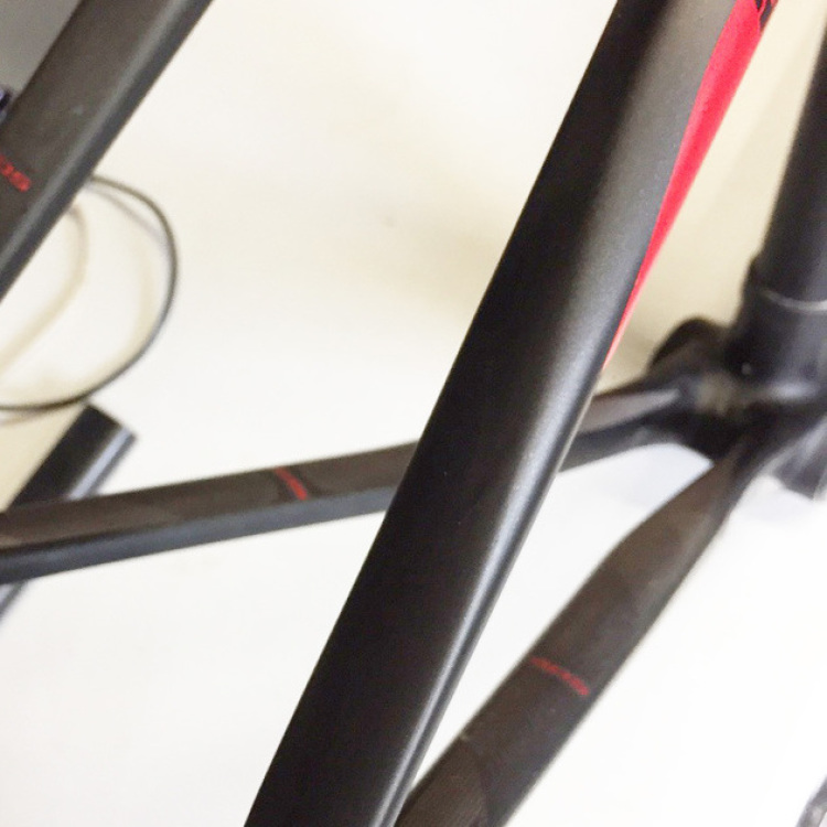 Scott CR1 Repair. Our Ruby level repair saves on the cost of reproducing what can be expensive frame graphics. We repaired the carbon fibre and finished in satin black with a hint of anthracite to blend into the existing